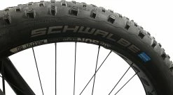 Schwalbe - Pneu Jumbo Jim 26" à Tringle Souple Snakeskin Addix Speedgrip -Velo Boutique schwalbe pneu jumbo jim 26 pouces snakeskin 3840x2160
